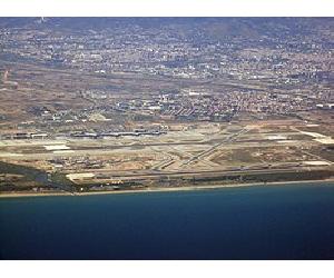 https://upload.wikimedia.org/wikipedia/commons/thumb/6/61/Airport_Barcelona_seen_from_air.jpg/266px-Airport_Barcelona_seen_from_air.jpg