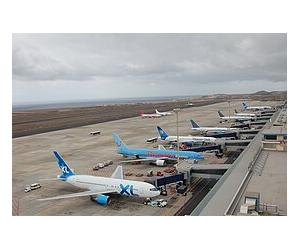 https://upload.wikimedia.org/wikipedia/commons/thumb/f/f1/Aeropuerto_de_Tenerife_Sur.jpg/275px-Aeropuerto_de_Tenerife_Sur.jpg