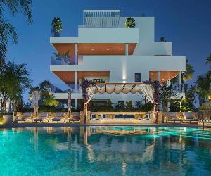 https://benalusmarbella.com/wp-content/uploads/2025/01/Preious-Benalus-pool-at-night.jpg