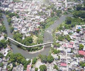 https://images.adsttc.com/media/images/614d/b92e/f91c/8148/e600/0121/slideshow/01_Jojutla_Bridge_Aerial_View_Copyright_OMA_NY.jpg?1632483593