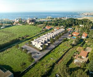 https://mome.pt/wp-content/uploads/2024/06/CAM_01_aerea-DJI_0441_DEPOIS_MURO-1-1.jpg