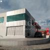 Edificio de Servicios y Centro de Lavado en Roces